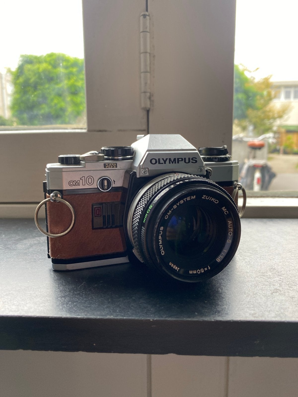 Olympus OM10 Spiegelreflexcamera met Zuiko 50mm f/1.8 lens, Audio, Tv en Foto, Ophalen of Verzenden, Gebruikt, Spiegelreflex, Olympus