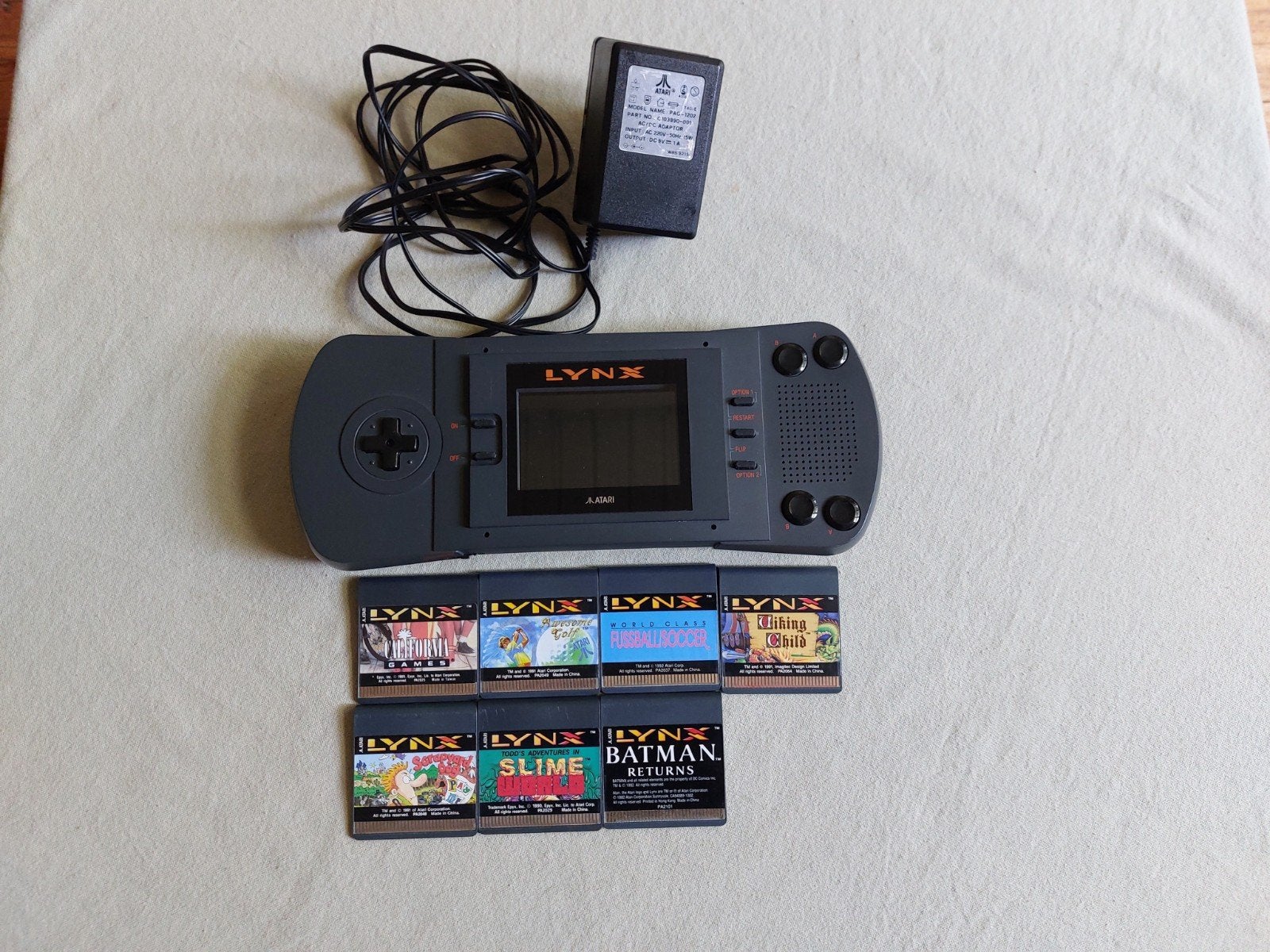 Atari lynx(start niet op, geen power) met games en adapter, Ophalen of Verzenden, Game Boy Pocket, Met games