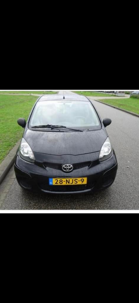 Toyota Aygo 1.0 12V Vvt-i 5DRS 2010 Zwart, Voorwielaandrijving, Stof, 4 stoelen, Origineel Nederlands