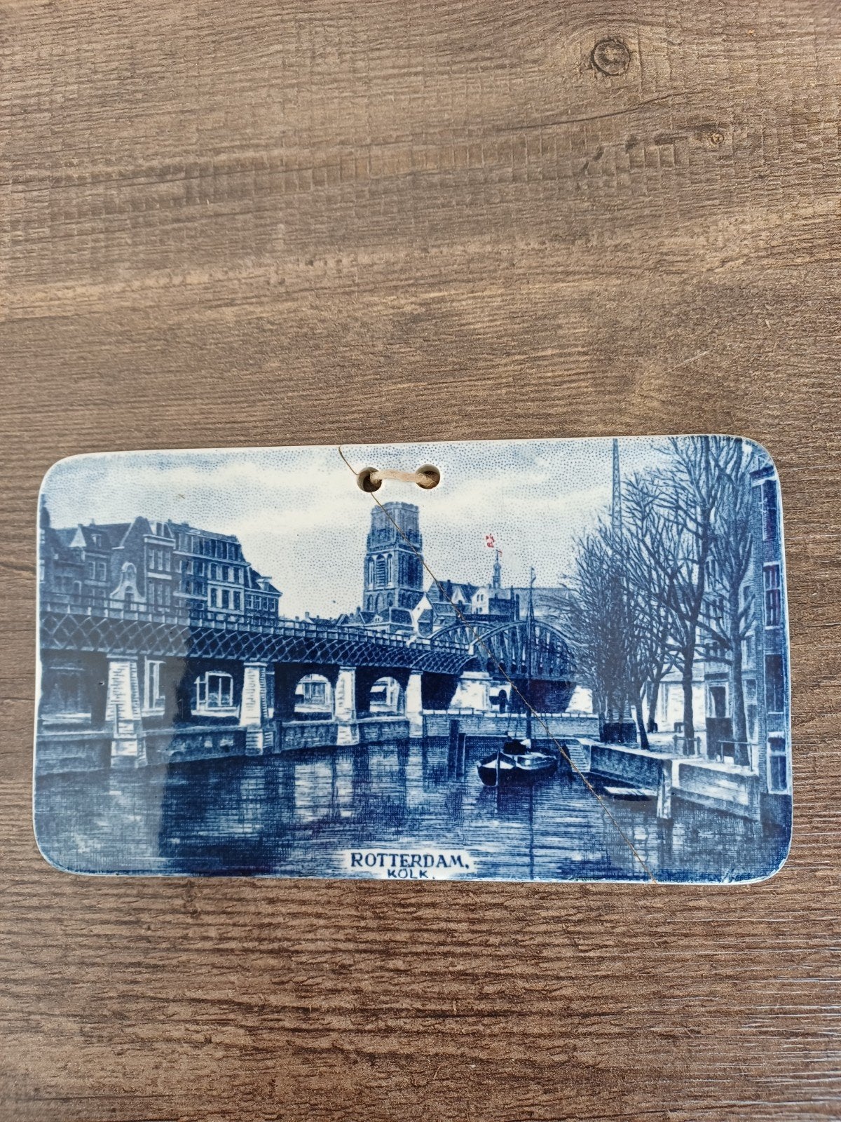 Antiek tegeltje Rotterdam, Ophalen