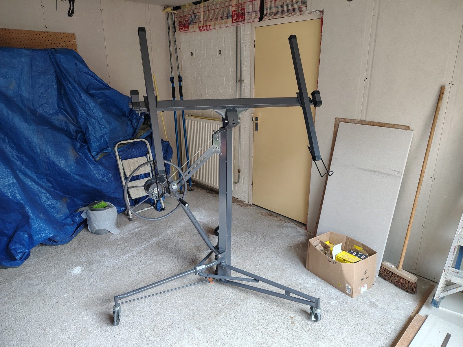 Plafondplatenlift / gipsplatenlift, Ophalen