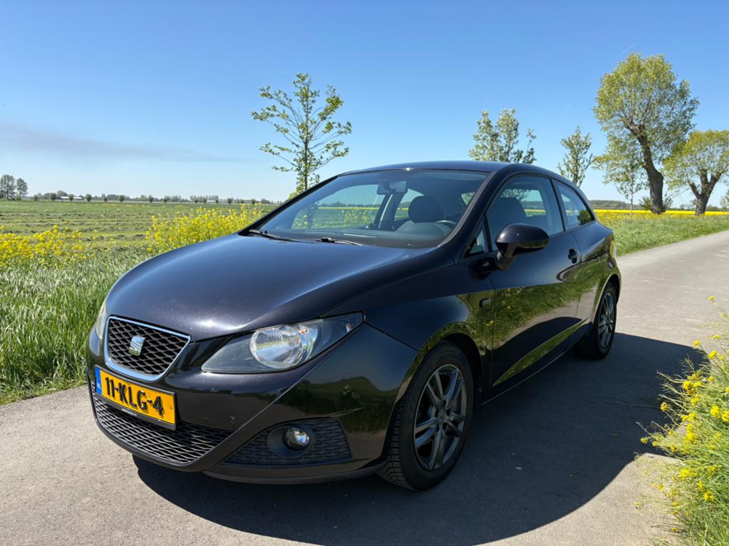 Seat Ibiza 1.4 63KW 3DRS 2010 Zwart, Auto's, Voorwielaandrijving, 40 €/maand, 4 cilinders, Multifunctioneel stuurwiel