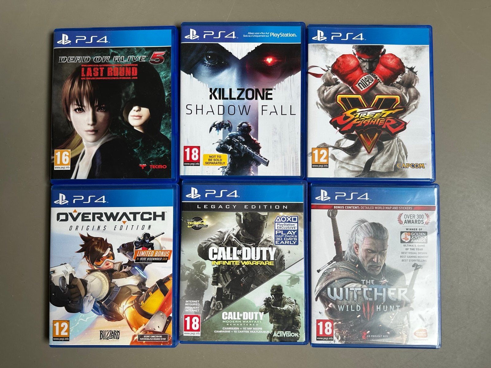 PS4 Games: Dead or Alive 5, Killzone, Street Fighter V, Over, Gebruikt, Vanaf 18 jaar, Overige genres, Eén computer