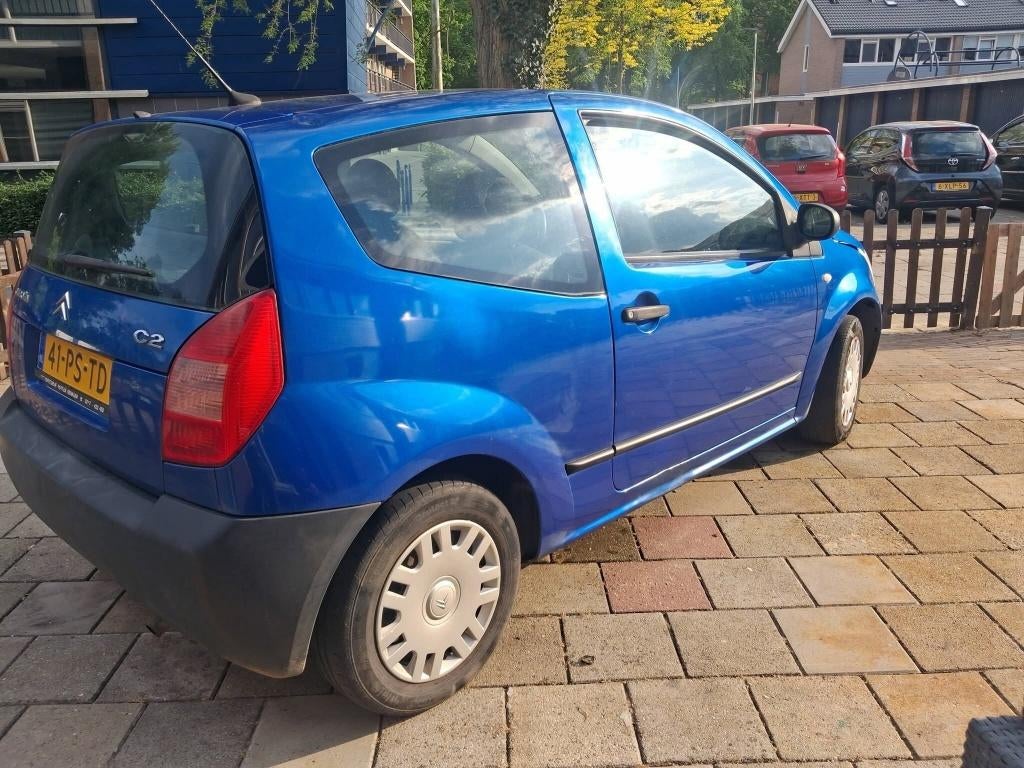 Citroën C2 1.1 I 2004 Blauw, Auto's, Citroën, Voorwielaandrijving, 31 €/maand, 4 cilinders, Origineel Nederlands