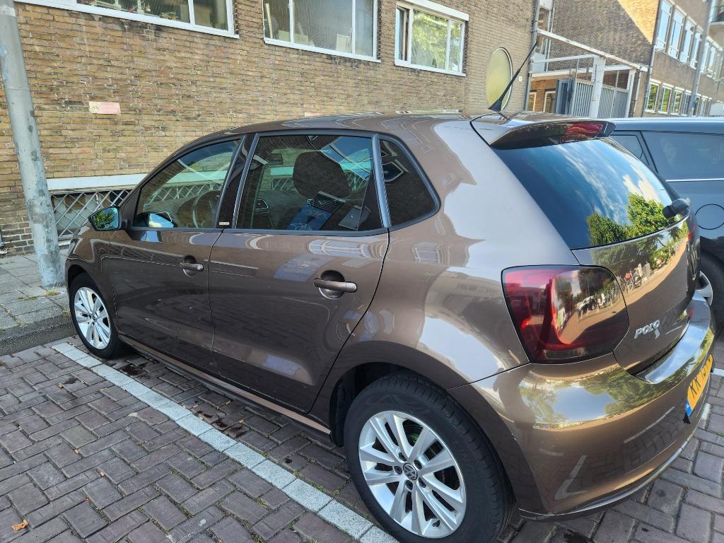 Volkswagen Polo 1.2  met nwe APK 51KW 2011 Bruin, Auto's, Volkswagen, Voorwielaandrijving, Euro 5, Zwart, Bruin