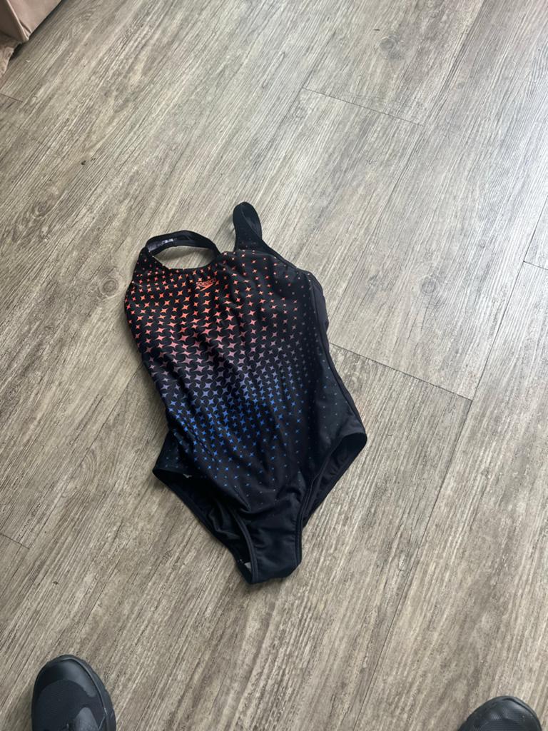 Speedo Badpak Zwart met Oranje/Blauwe Sterrenprint, Gebruikt, Meisje, Badpak, Ophalen of Verzenden