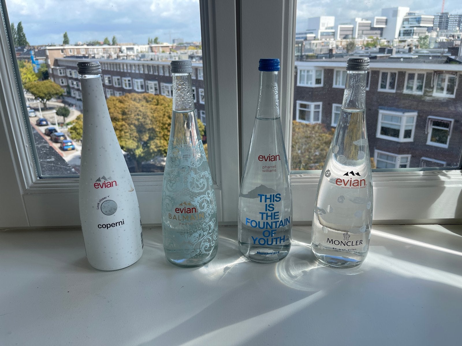 4 Evian Limited Edition Flessen - Coperni, Balmain, Moncler, Ophalen, Zo goed als nieuw