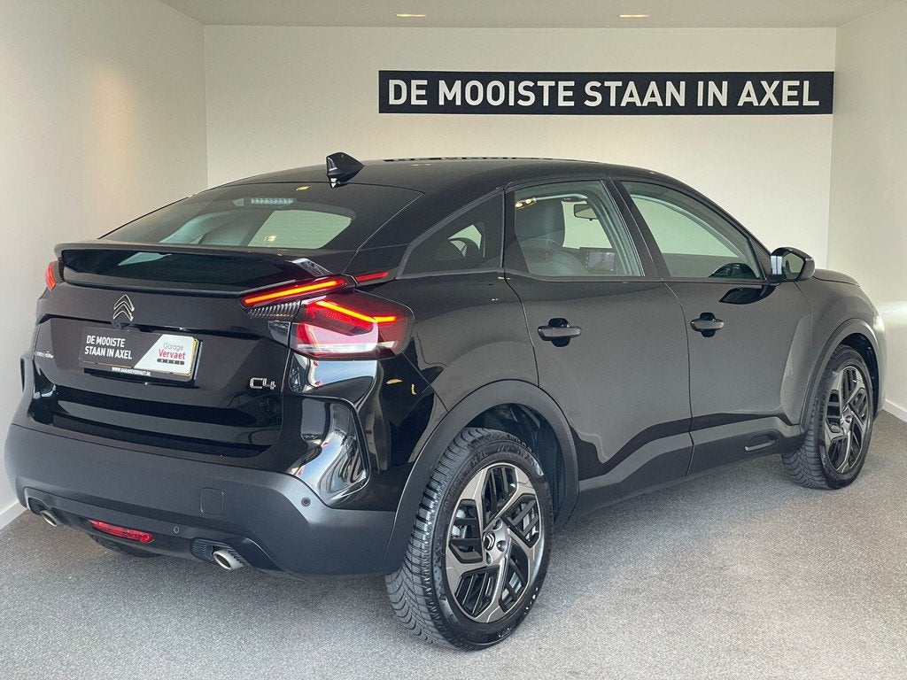 Citroën C4 1.2 Puretech Shine (bj 2023, automaat), Auto's, Citroën, Gebruikt, 1199 cc, Leder en Stof, Zwart