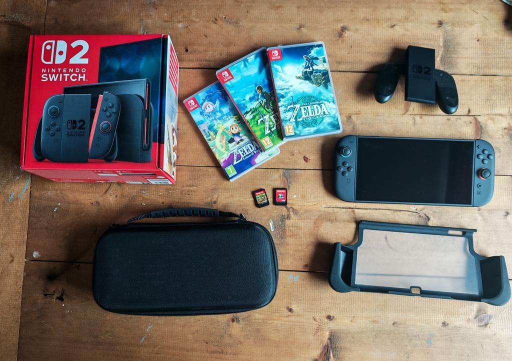 Nintendo Switch 2 met 5 games, reiskoffer en grips, Met games, Met 2 controllers, Ophalen of Verzenden, Zo goed als nieuw