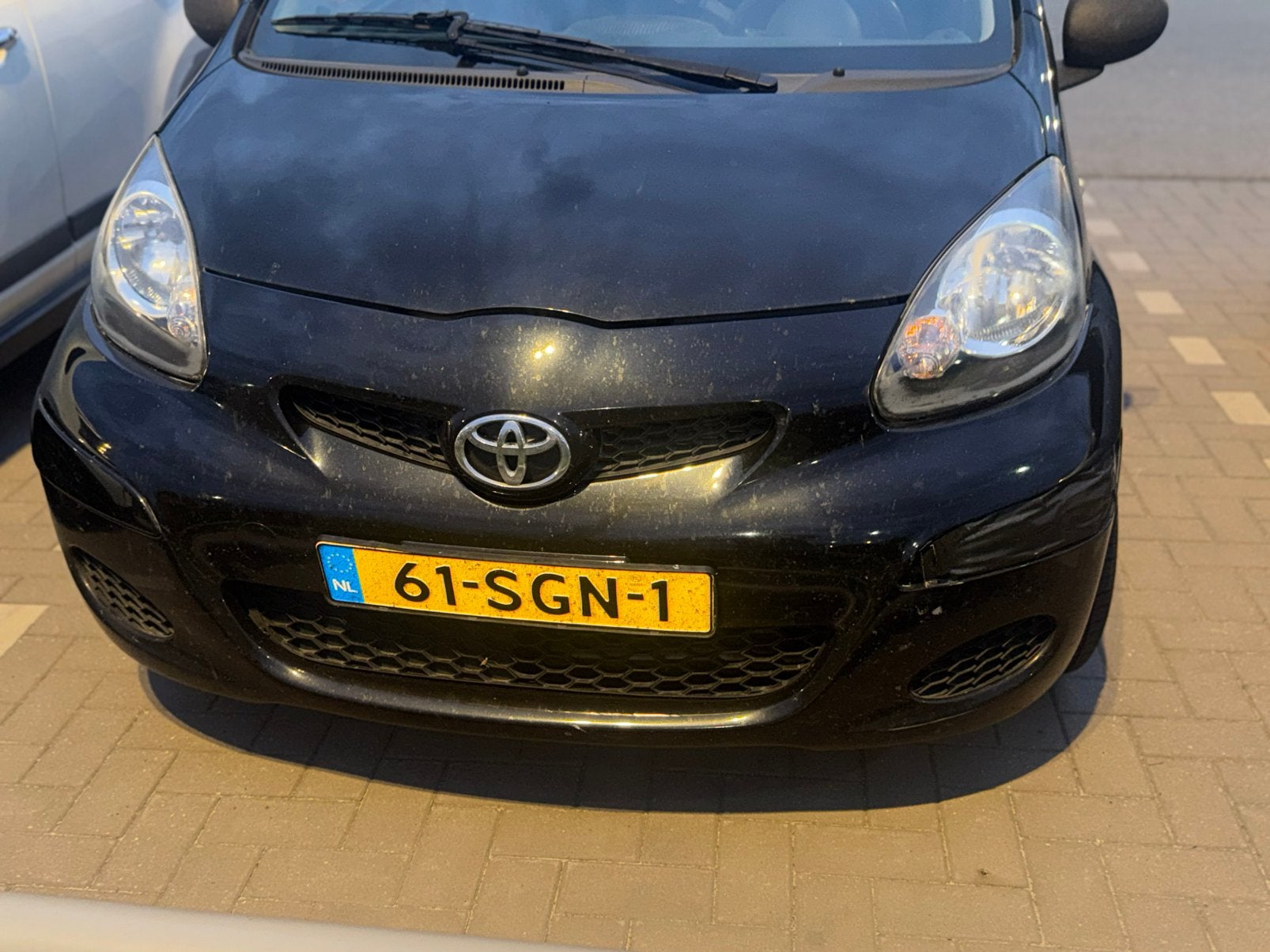 Toyota Aygo 1.0 12V Vvt-i 5DRS 2011 Zwart, Auto's, Voorwielaandrijving, 4 stoelen, Origineel Nederlands, Handgeschakeld