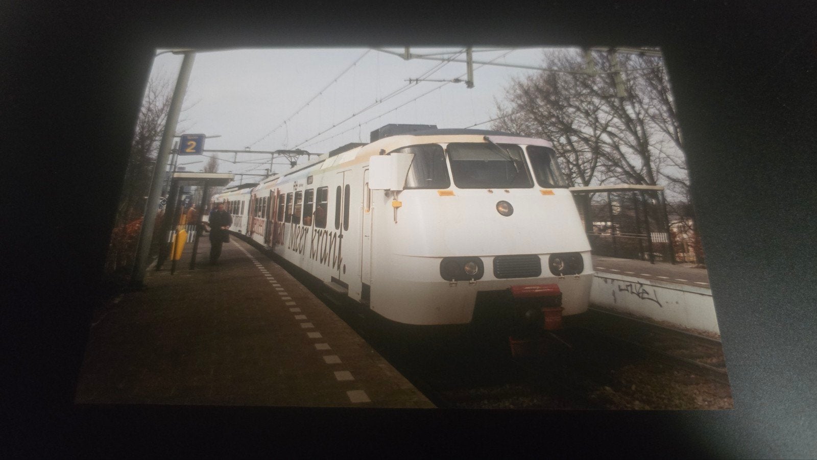 Foto van een trein op een station, Ophalen of Verzenden