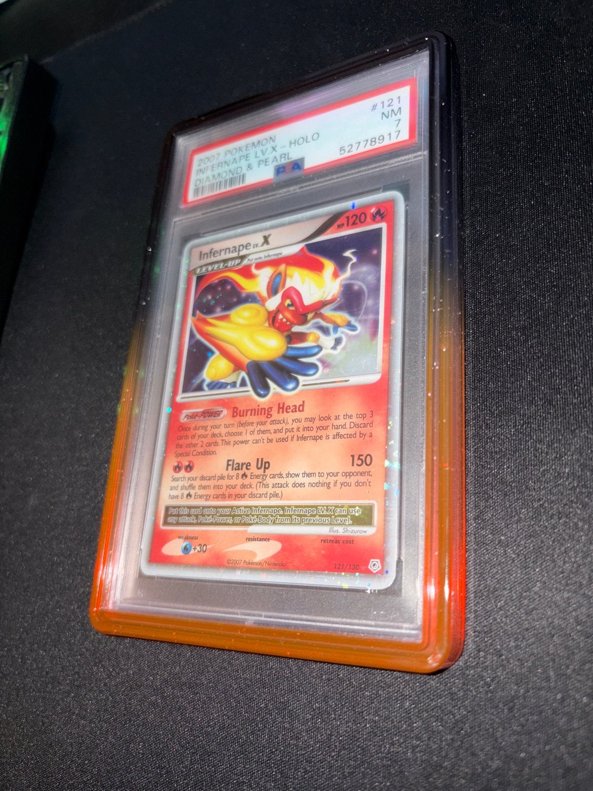Pokémon Infernape LV.X Holo PSA 7 Diamond & Pearl #121, Ophalen of Verzenden, Zo goed als nieuw, Losse kaart, Foil