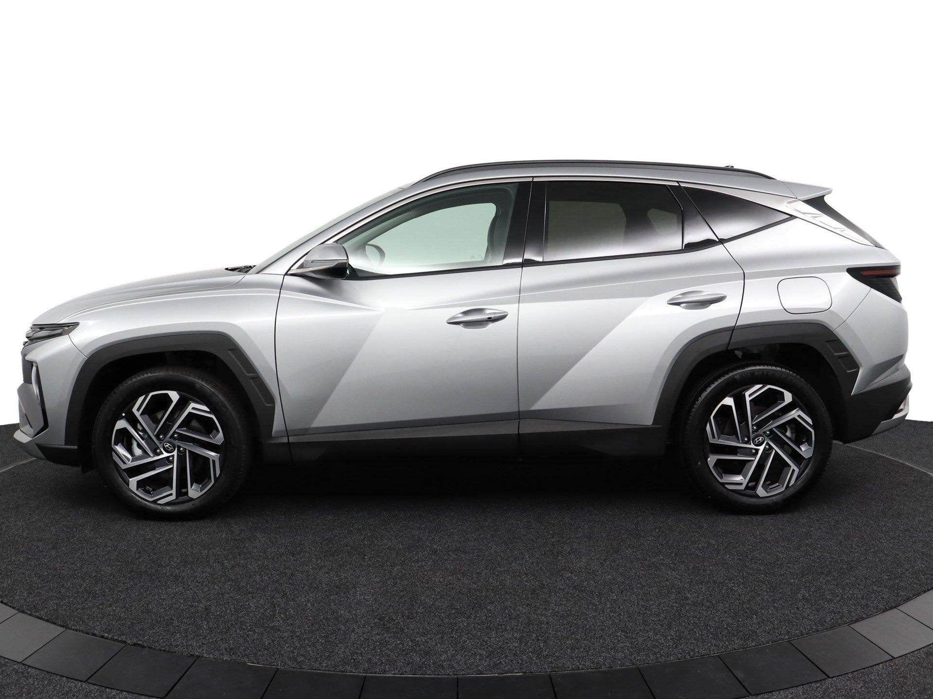 Hyundai Tucson 1.6 T-GDI PHEV Comfort Smart | Uit Voorraad L, Auto's, Dealer onderhouden, 14 kWh, 4 cilinders, Leder en Stof