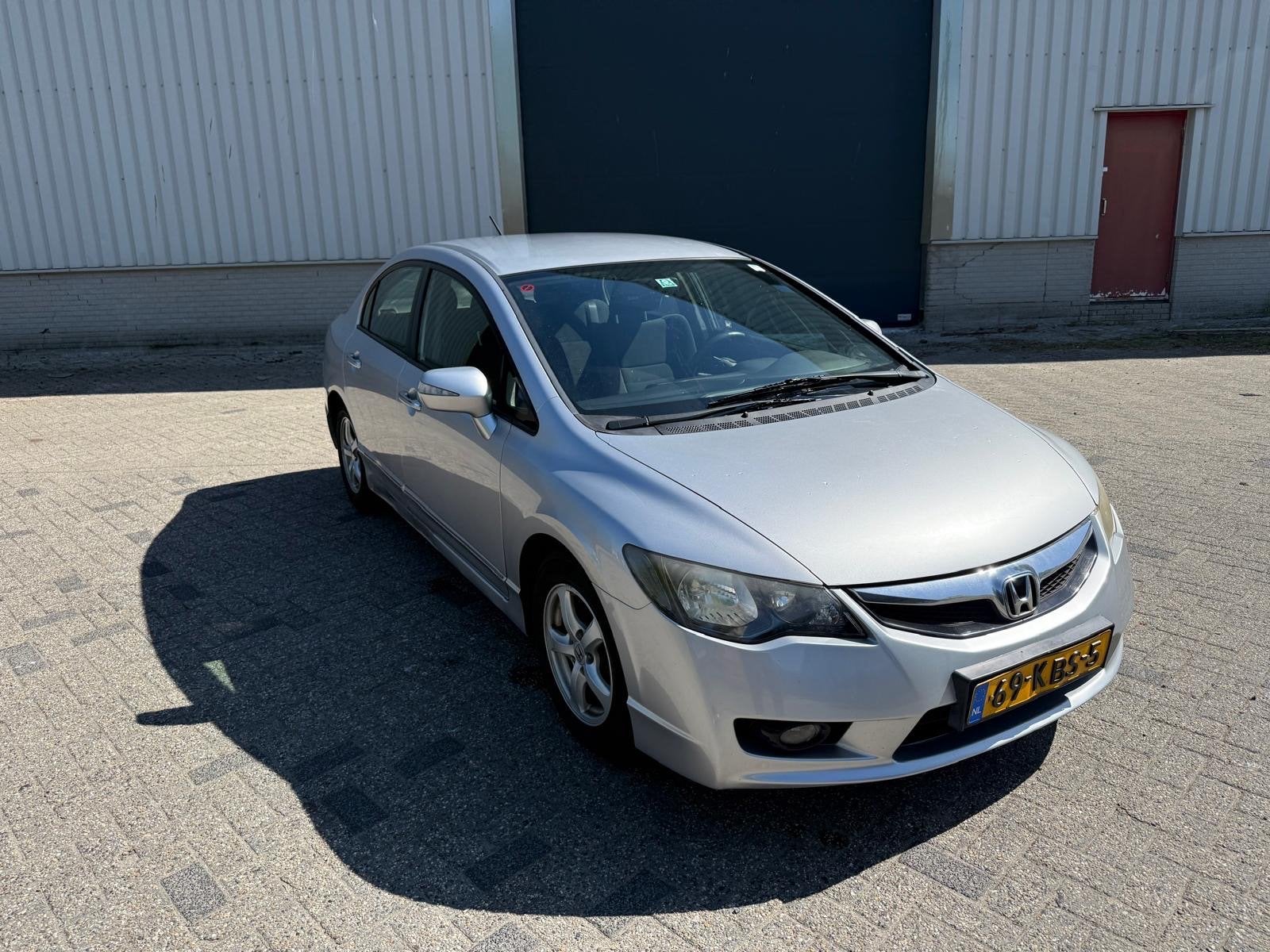 Honda Civic 1.3 Vtec Hybrid 4DR C-tr. 2009 Grijs, Auto's, Origineel Nederlands, Bedrijf, Hybride Elektrisch/Benzine, 22 km/l