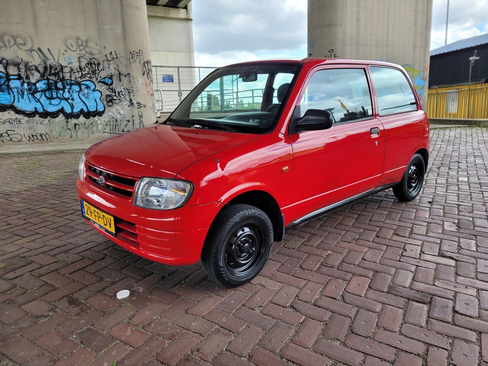Daihatsu Cuore STI 1.0 55pk 3 cilinder 2000 NIEUWE APK , Auto's, Daihatsu, Voorwielaandrijving, Stof, Zwart, 18 €/maand