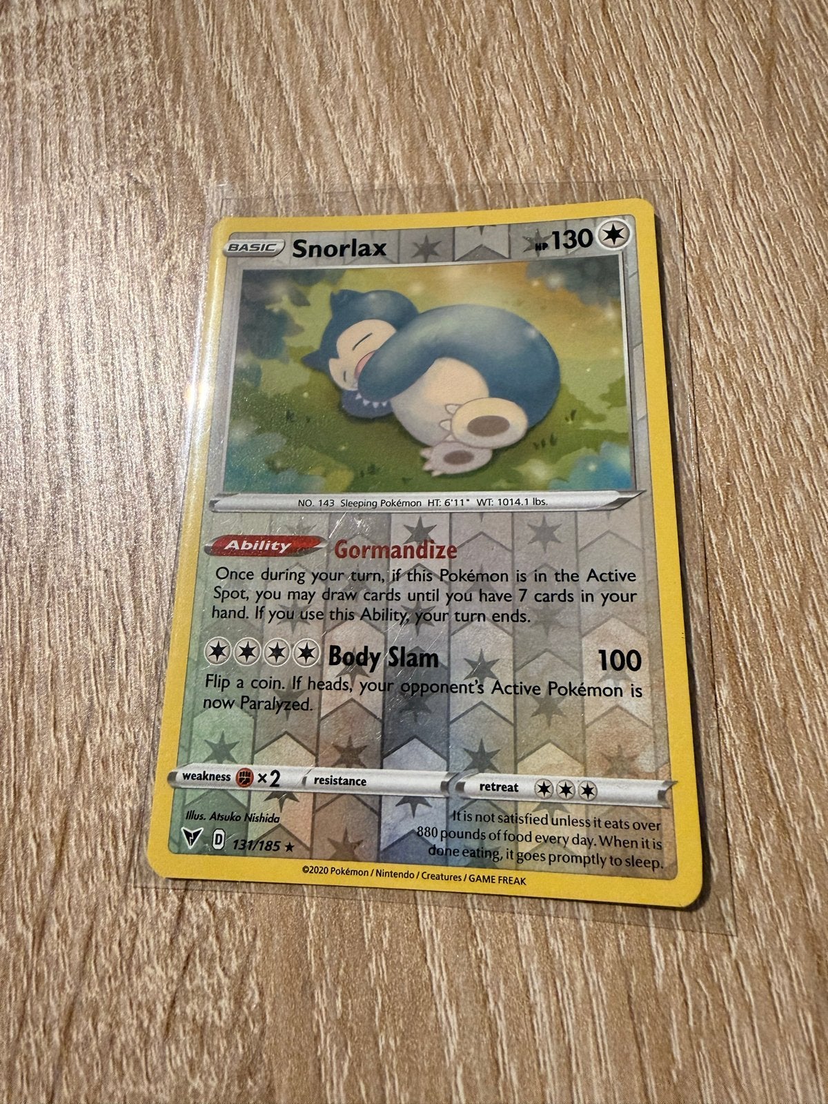 Snorlax Pokémon Kaart 131/185 - Sword & Shield Vivid Voltage, Ophalen of Verzenden, Zo goed als nieuw, Losse kaart, Foil