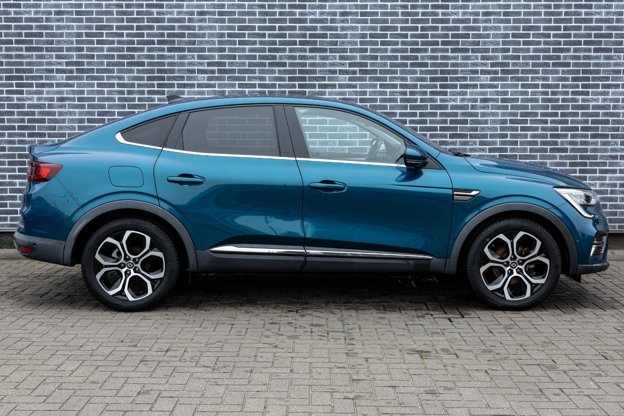 Renault Arkana 1.6 E-Tech Hybrid 145 Intens | Trekhaak | Ach, Auto's, Gebruikt, Blauw, Leder en Stof, Origineel Nederlands