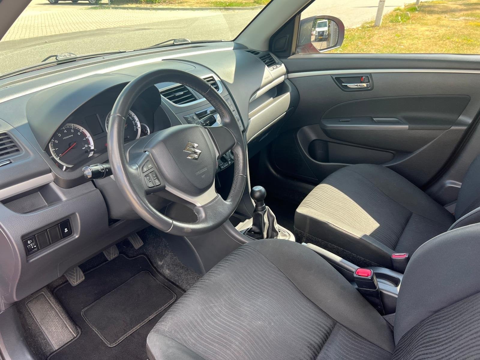 Suzuki Swift 1.2 Comfort 5DRS 2011 Airco N.A.P, Voorwielaandrijving, Stof, Gebruikt, 4 cilinders