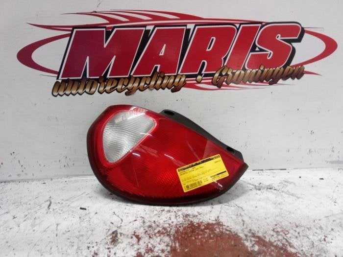 Achterlicht links van een Daihatsu Sirion, Gebruikt, Daihatsu, -, -