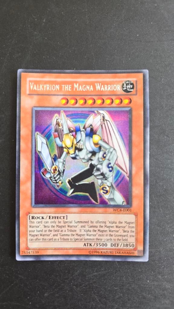 Valkyrion the Magna Warrior Yu-Gi-Oh! WC4-E001 Mint, Ophalen of Verzenden, Nieuw, Losse kaart, Foil