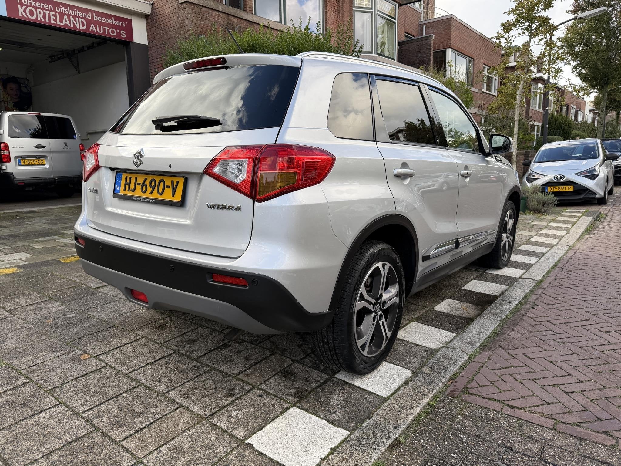 Suzuki Vitara 1.6 High Executive 1e eigenaar, Auto's, Voorwielaandrijving, 4 cilinders, Met garantie (alle), 400 kg