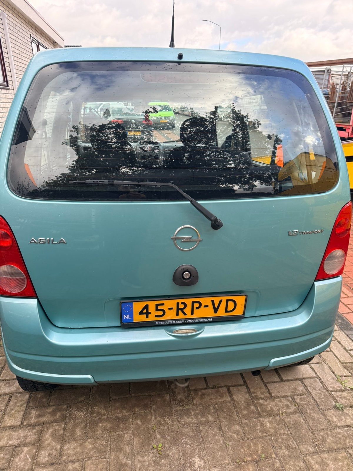 Opel Agila 1.2 16V Twinport 2005 Groen, Schade auto!, Auto's, Voorwielaandrijving, Stof, 40 €/maand, 4 cilinders