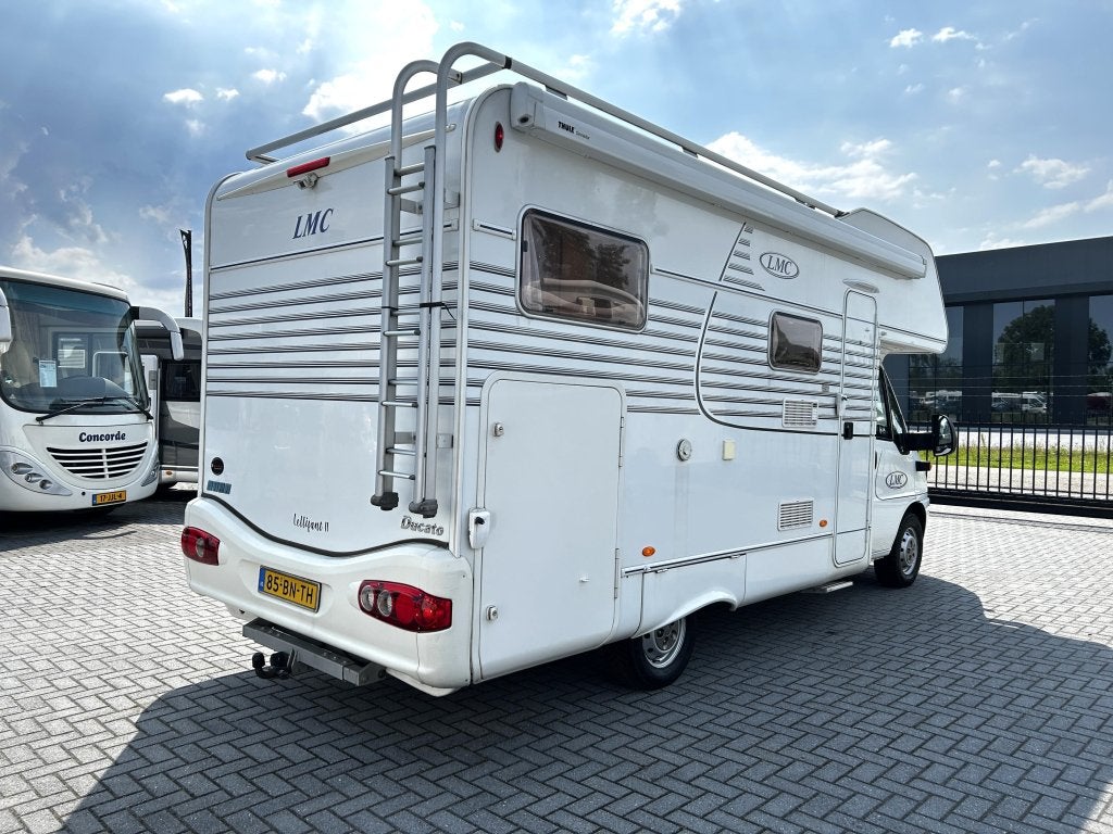 LMC Liberty A 620 xl-garage/128pk/bar-zit/2004/alkoof, Caravans en Kamperen, Alkoof, Fiat, 6 tot 7 meter, Bedrijf