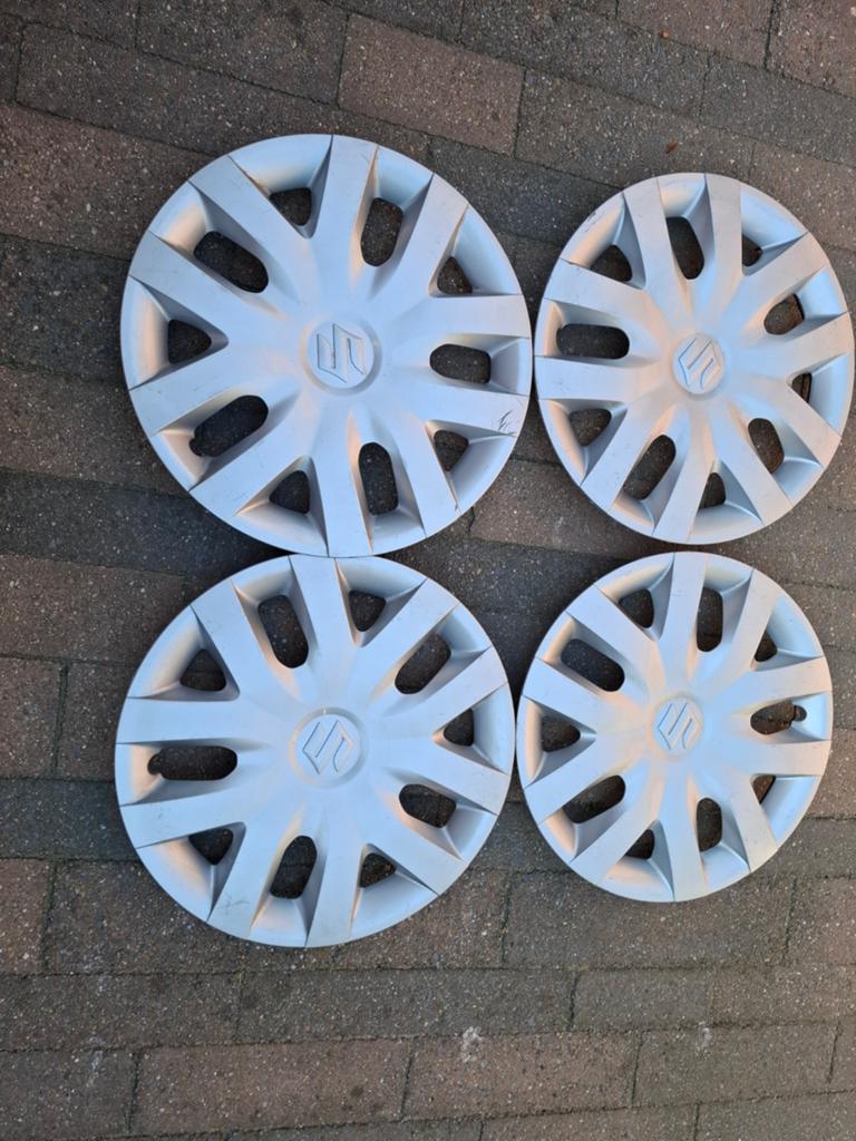 Originele set wieldoppen 15 inch suzuki swift, Ophalen of Verzenden, Gebruikt