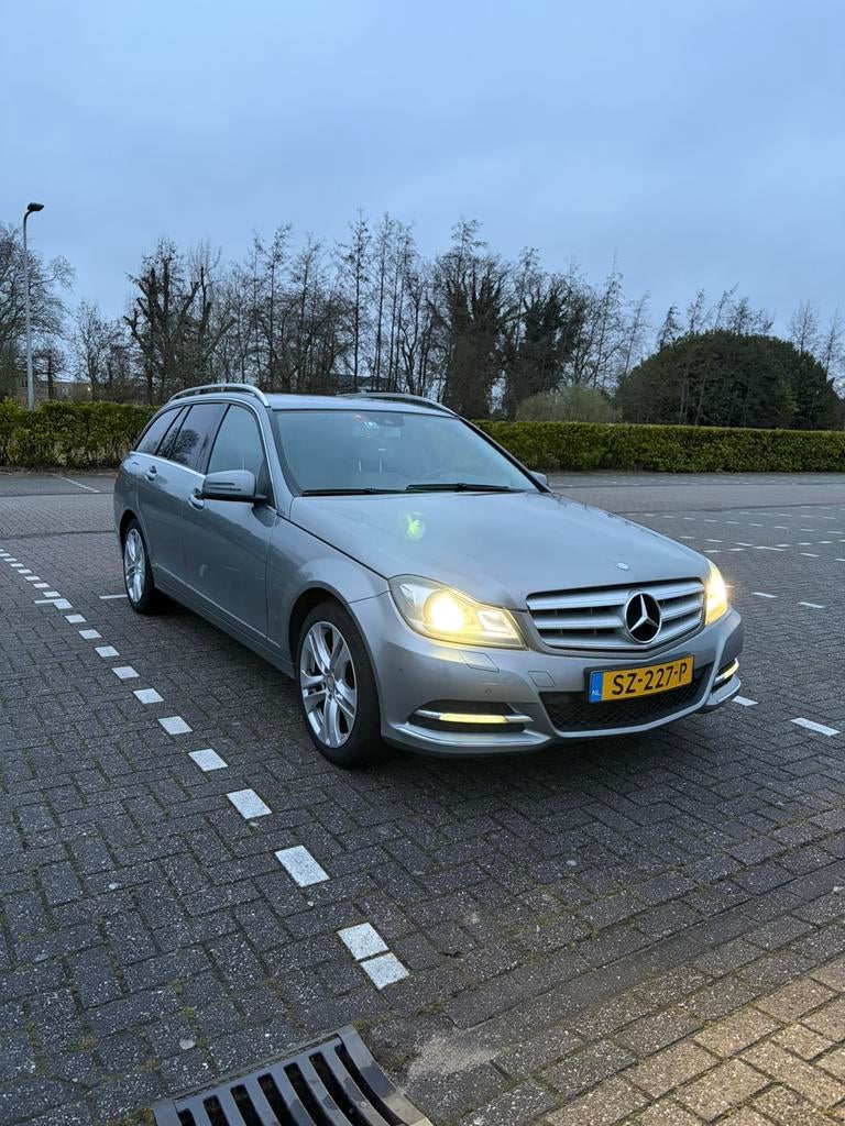 Mercedes-Benz C-Klasse 2.2 CDI C220 Estate AUT 2012 Grijs, Auto's, Automaat, Euro 5, Achterwielaandrijving, 1800 kg
