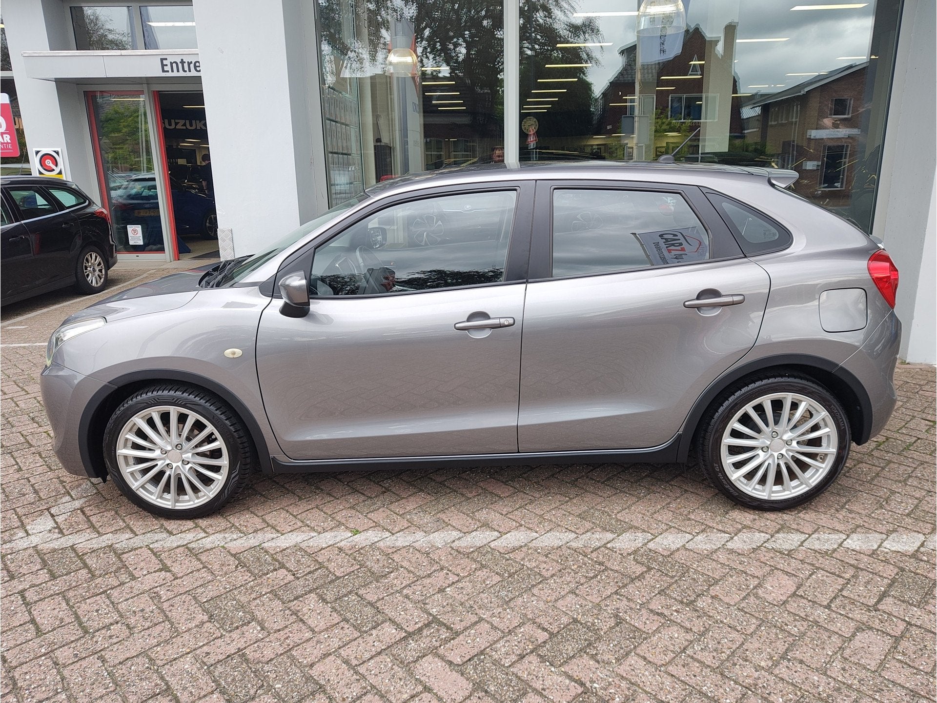 Suzuki Baleno 1.2 DYNAMIC Navi | Cruise | Parkeercamera, Auto's, Voorwielaandrijving, 12 maanden, Gebruikt, 4 cilinders