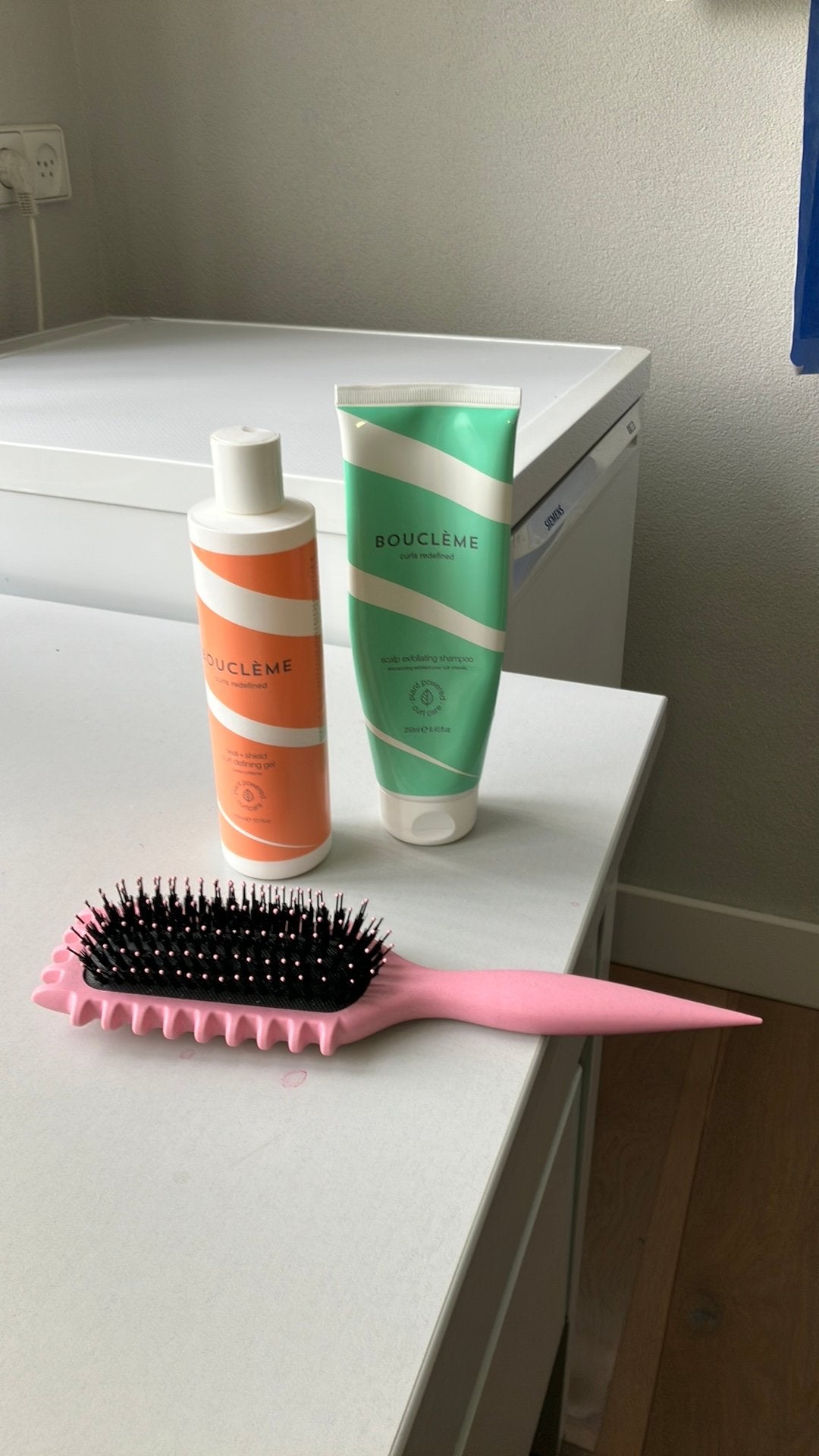 Boucleme gel en shampoo en borstel, Ophalen of Verzenden, Gebruikt, Gel, Wax, Haarlak of Mousse