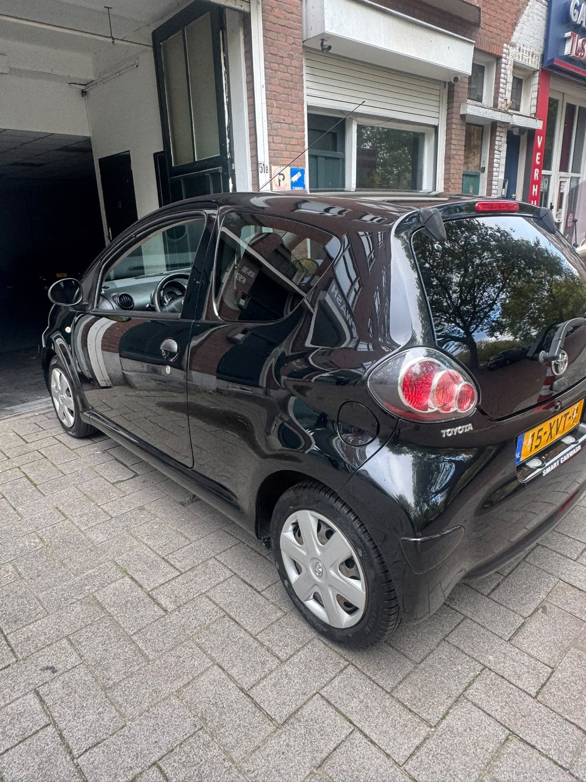 Toyota Aygo 1.0 12V Vvt-i 3DRS MMT 2011 Zwart, Auto's, Voorwielaandrijving, 4 stoelen, Handgeschakeld, Particulier