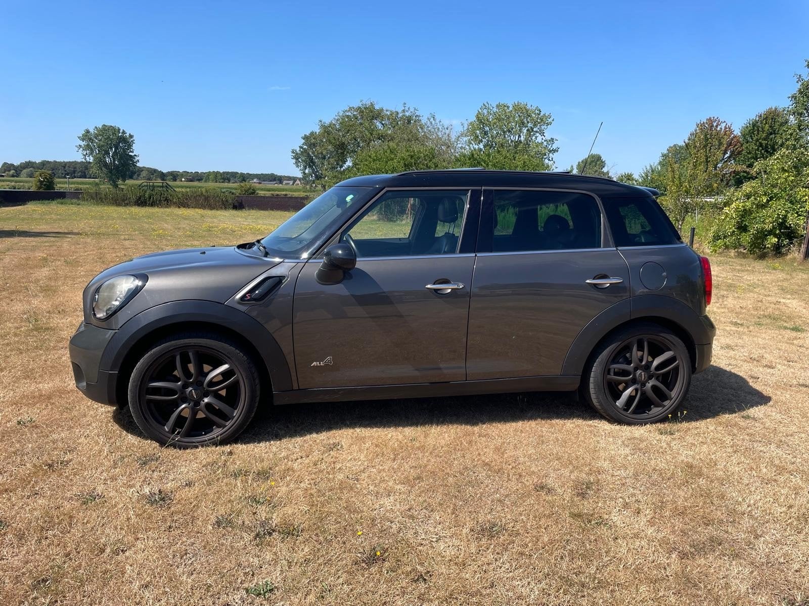 Mini Countryman 1.6 Cooper S All4 AUT 2013 Grijs, Auto's, Mini, 1380 kg, Zwart, Leder en Stof, Origineel Nederlands