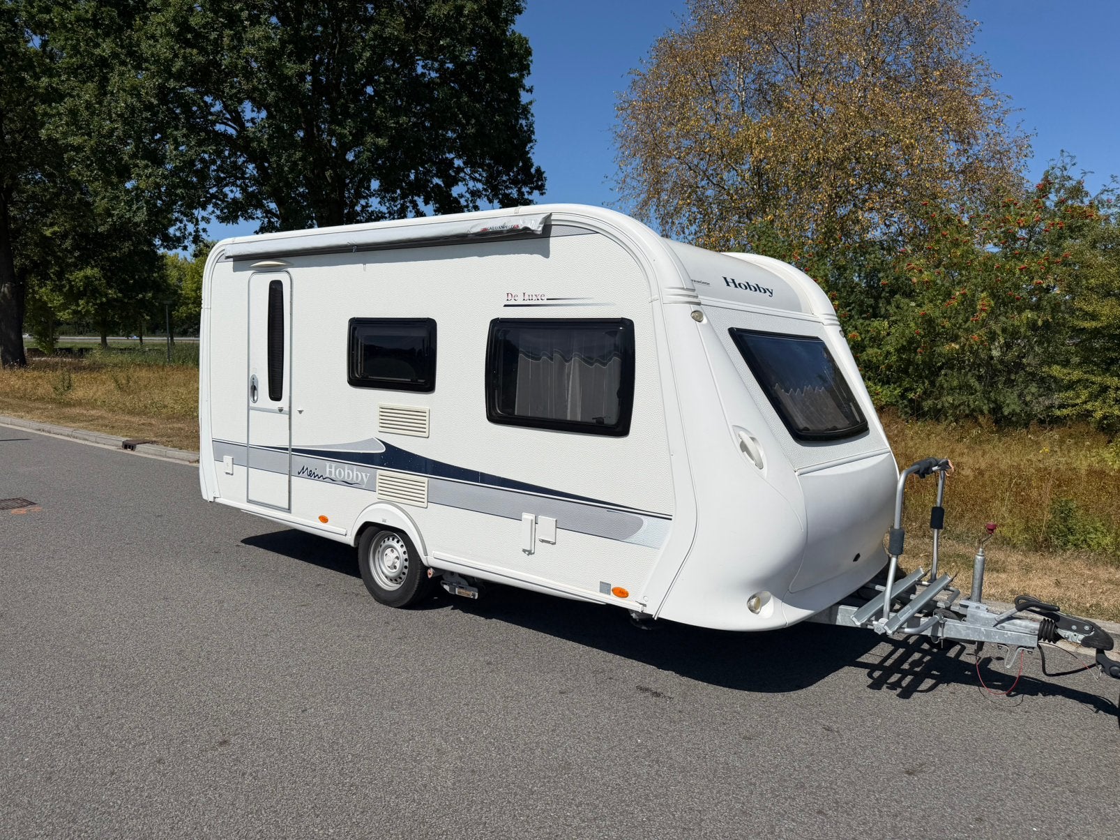 Hobby De Luxe 440SF |Bankairco | Mover | Zakluifel |Voortent, Caravans en Kamperen, Caravans, Kachel, Hobby, Dwarsbed, Bedrijf