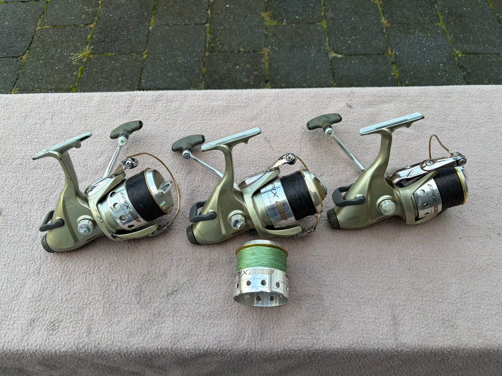 3 x okuma epix eb 65 baitrunner molens incl 1 spoel, Ophalen of Verzenden, Gebruikt, Molen