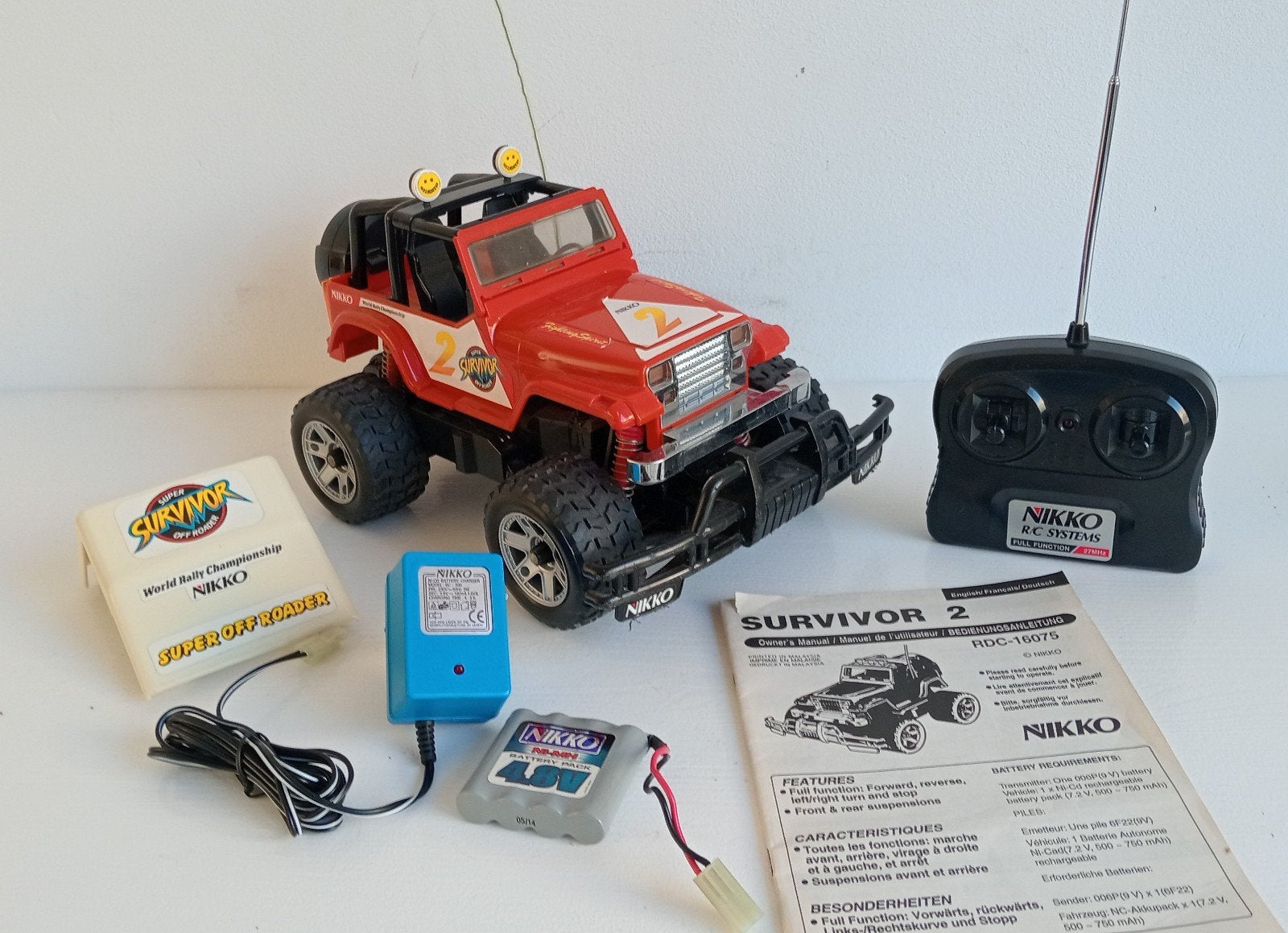 Vintage RC Nikko Jeep Wrangler Survivor 1:14, Hobby en Vrije tijd, Ophalen of Verzenden, Gebruikt, Overige schalen, Auto onroad