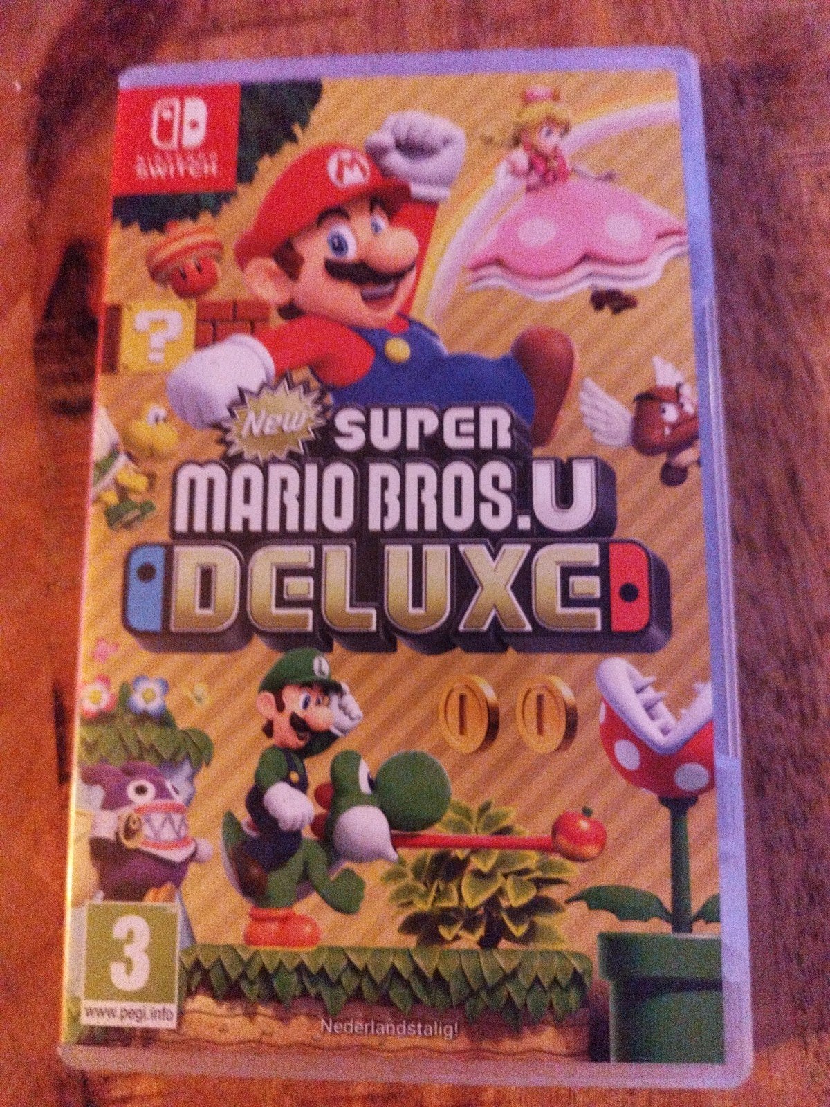 Super Mario Bros U Deluxe, Spelcomputers en Games, Games | Nintendo Switch, Avontuur en Actie, Ophalen of Verzenden, Zo goed als nieuw
