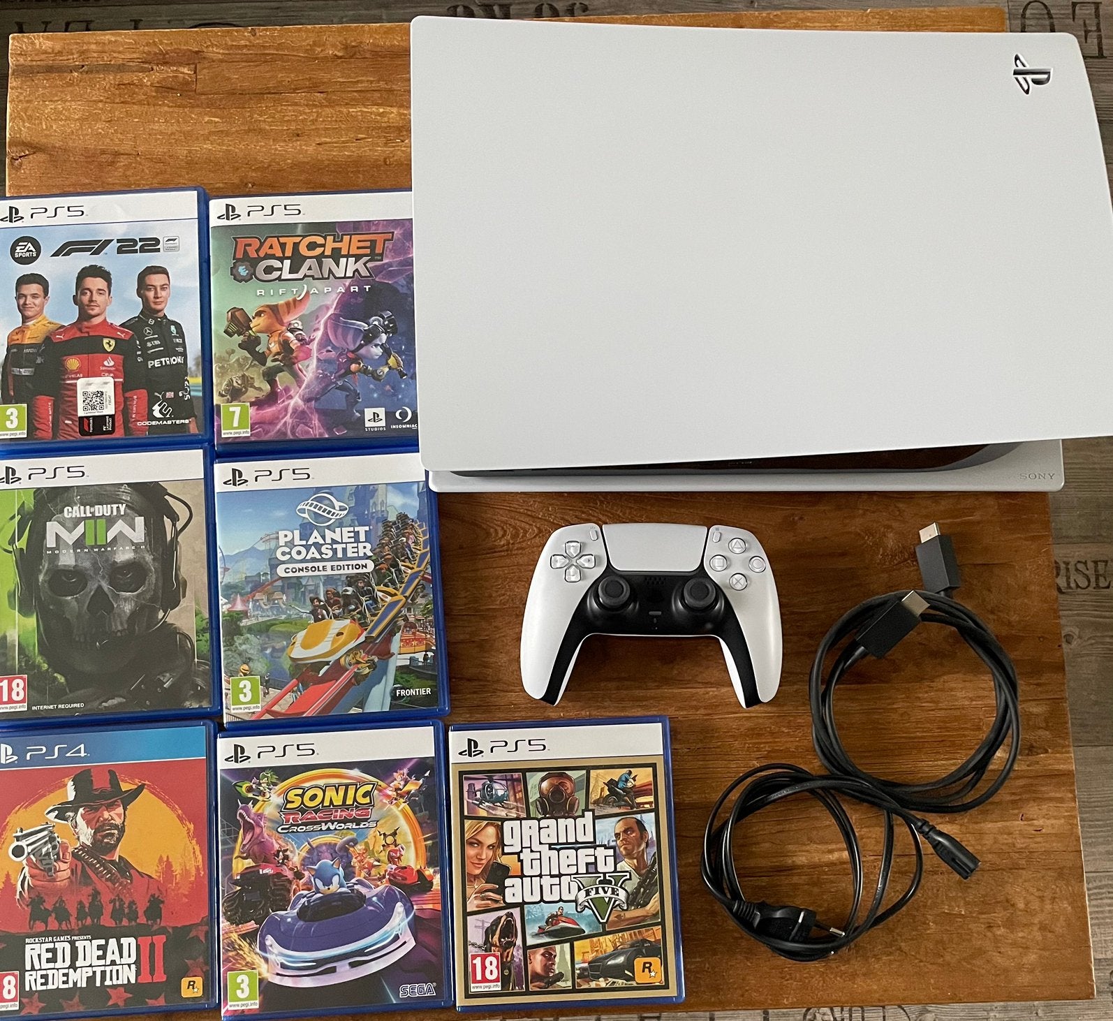 PlayStation 5 Disc Edition (CFI-1216A) + 7 Games