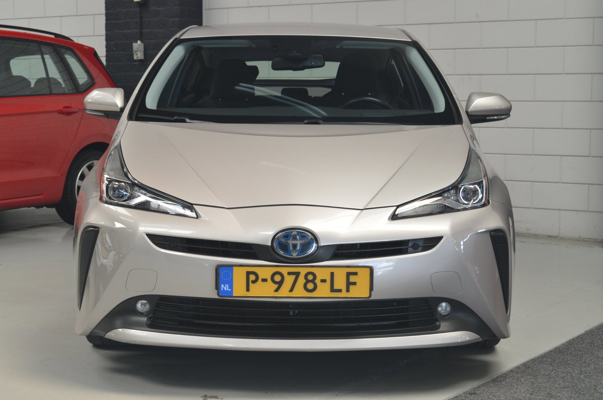 Toyota Prius 1.8 Dynamic // NAVI // CAMERA // ADAPTIVE CRUIS, Auto's, Toyota, Stof, 98 pk, Hybride Elektrisch/Benzine, Stoelverwarming