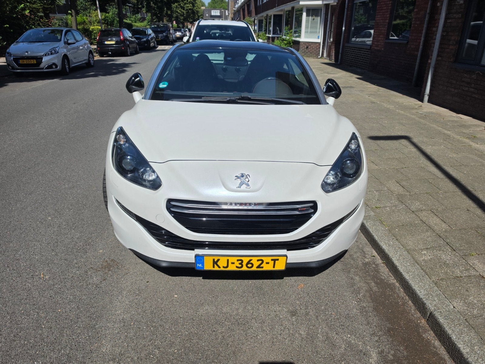 Peugeot RCZ 1.6 THP 200 2015 Wit, Auto's, Peugeot, 1272 kg, 15 km/l, Zwart, 4 cilinders