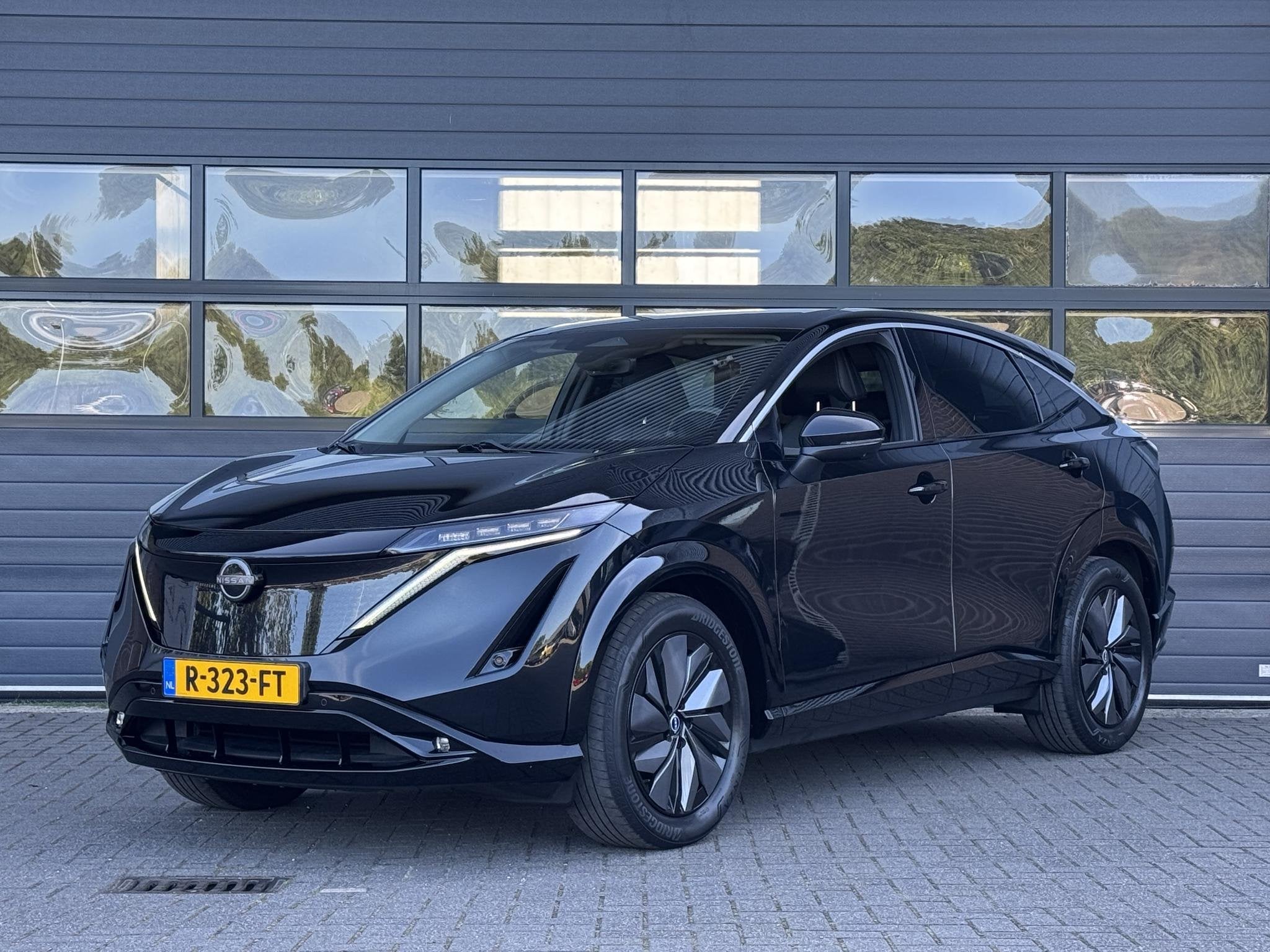 NISSAN ARIYA ADVANCE 66 kWh (99% SOH) I AUTOMAAT I P-CAMERA, Auto's, Stof, Gebruikt, Met garantie (alle), 40 min