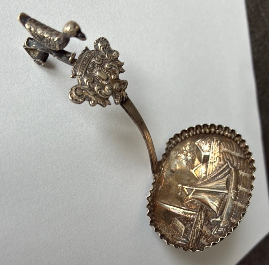 Antieke Zilveren Roomlepel met Gedetailleerde Versieringen, Antiek en Kunst, Ophalen of Verzenden, Zilver