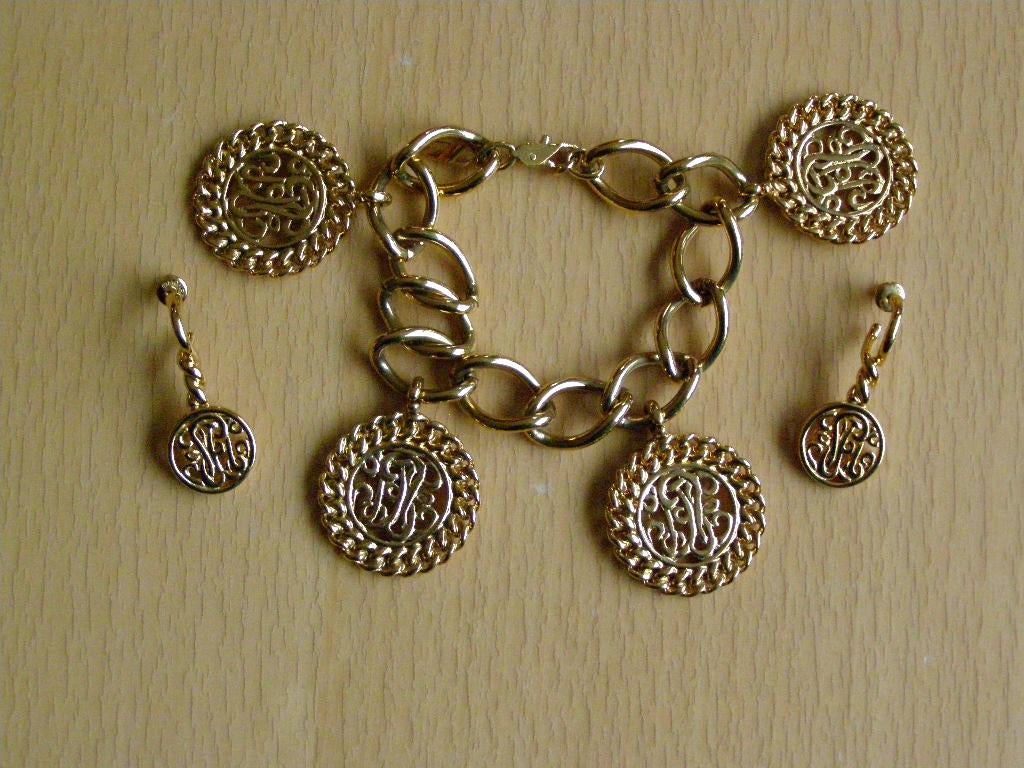 MONET SET VINTAGE ARMBAND OORSTEKERS VERGULD OORBELLEN, Sieraden, Tassen en Uiterlijk, Armbanden, Ophalen of Verzenden, Zo goed als nieuw