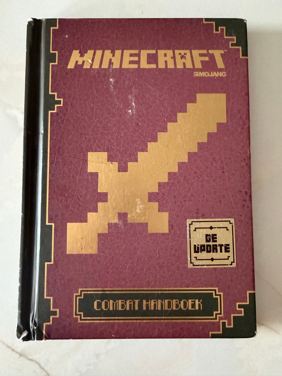 Minecraft Combat Handboek - De Update (Redelijke staat), Ophalen of Verzenden, Gelezen