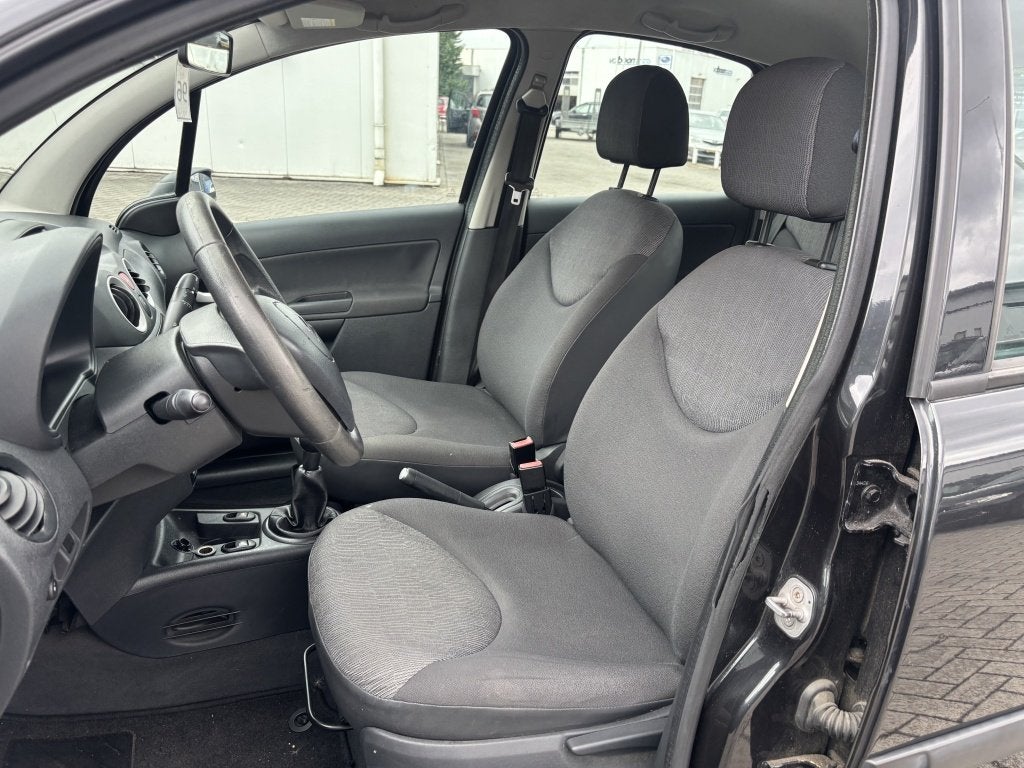Citroën C3 1.1i Ligne Prestige met Airco (bj 2009), Stof, 60 pk, 920 kg, Zwart