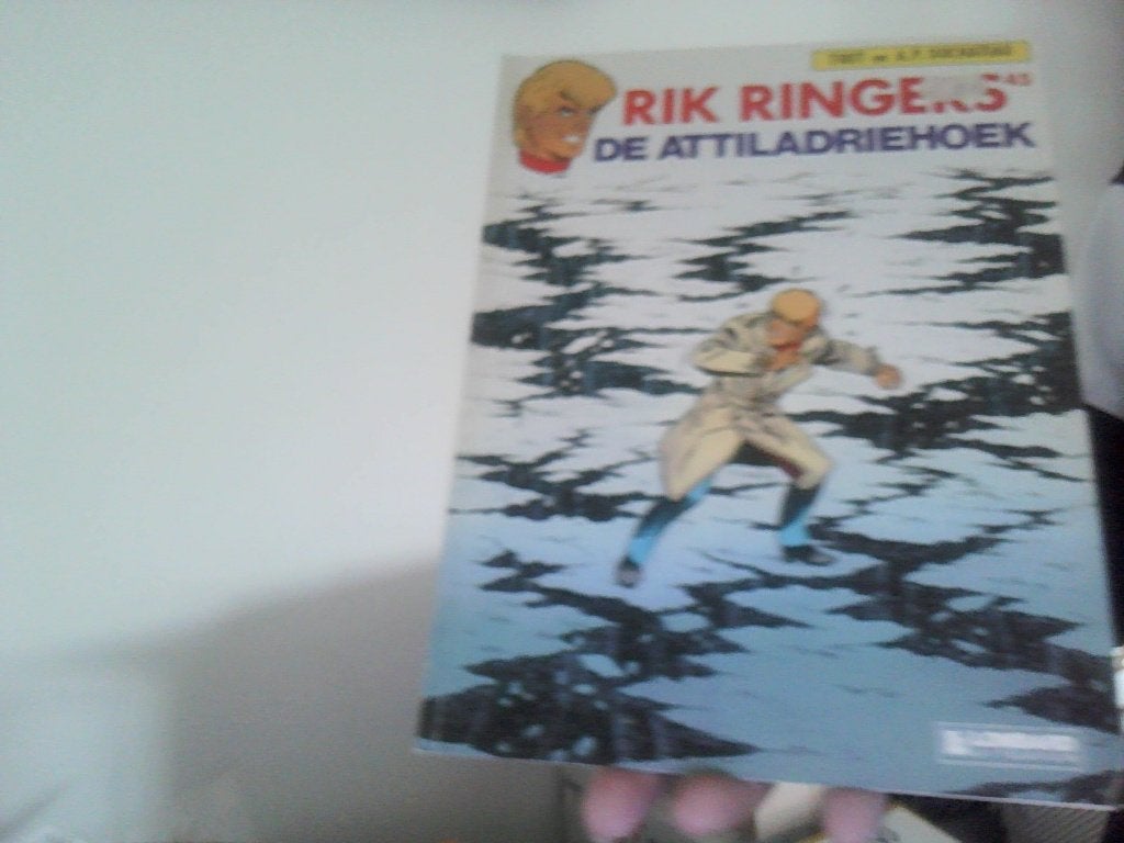 rik ringers nr 45 de attiladriehoek eerste druk 1988 lombard, Eén stripboek, Ophalen of Verzenden, Zo goed als nieuw