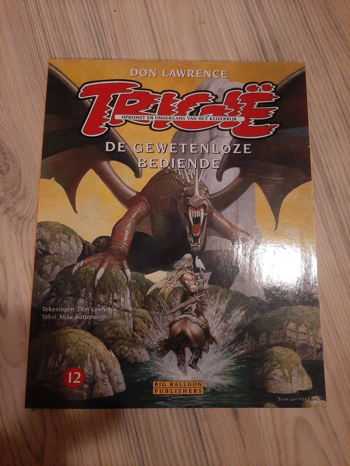 Trigie: De Gewetenloze Bediende - Don Lawrence, Ophalen of Verzenden, Zo goed als nieuw, Don Lawrence