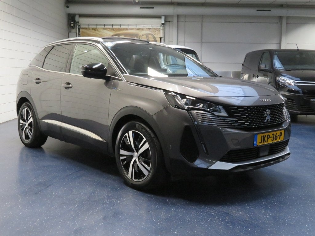 Peugeot 3008 1.6 HYbrid4 300 GT (bj 2023, automaat), Auto's, Peugeot, Automaat, Euro 6, 4 cilinders, Leder en Stof