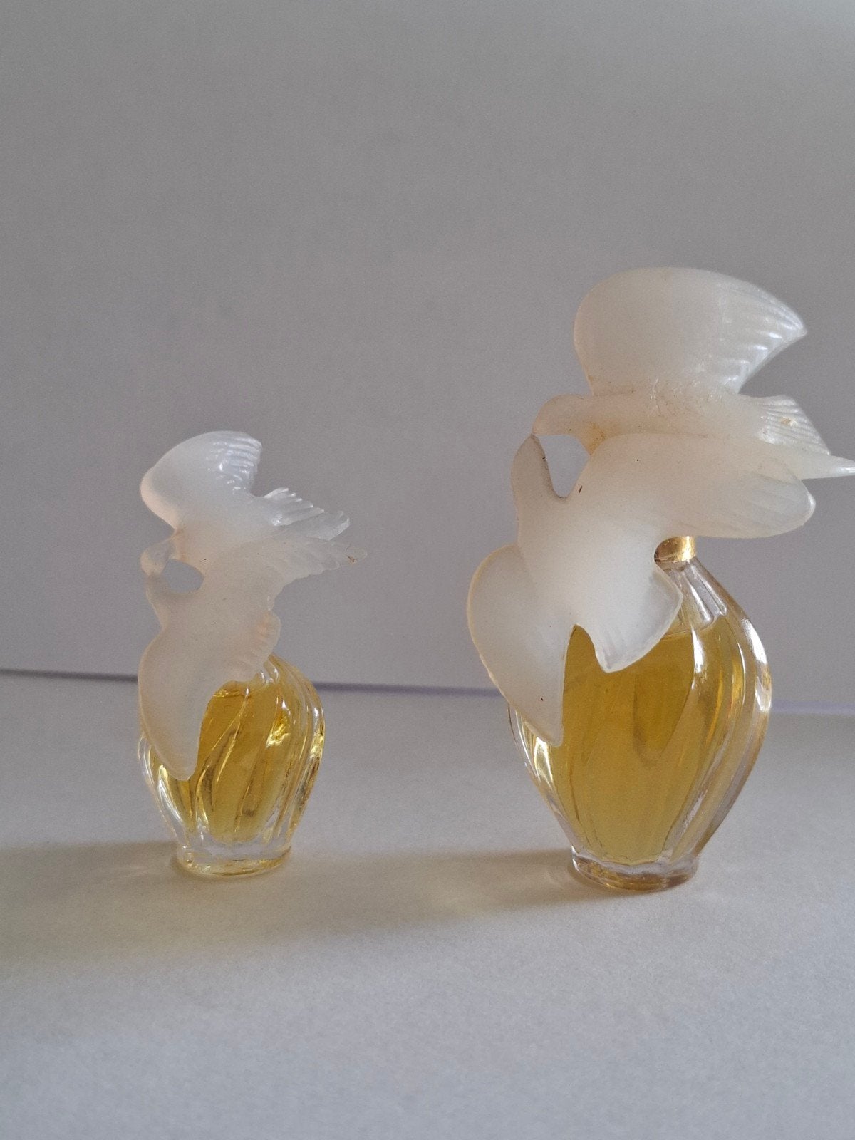 Vintage Lalique L'Air du Temps parfumflesjes (2 stuks), Ophalen of Verzenden, Gebruikt