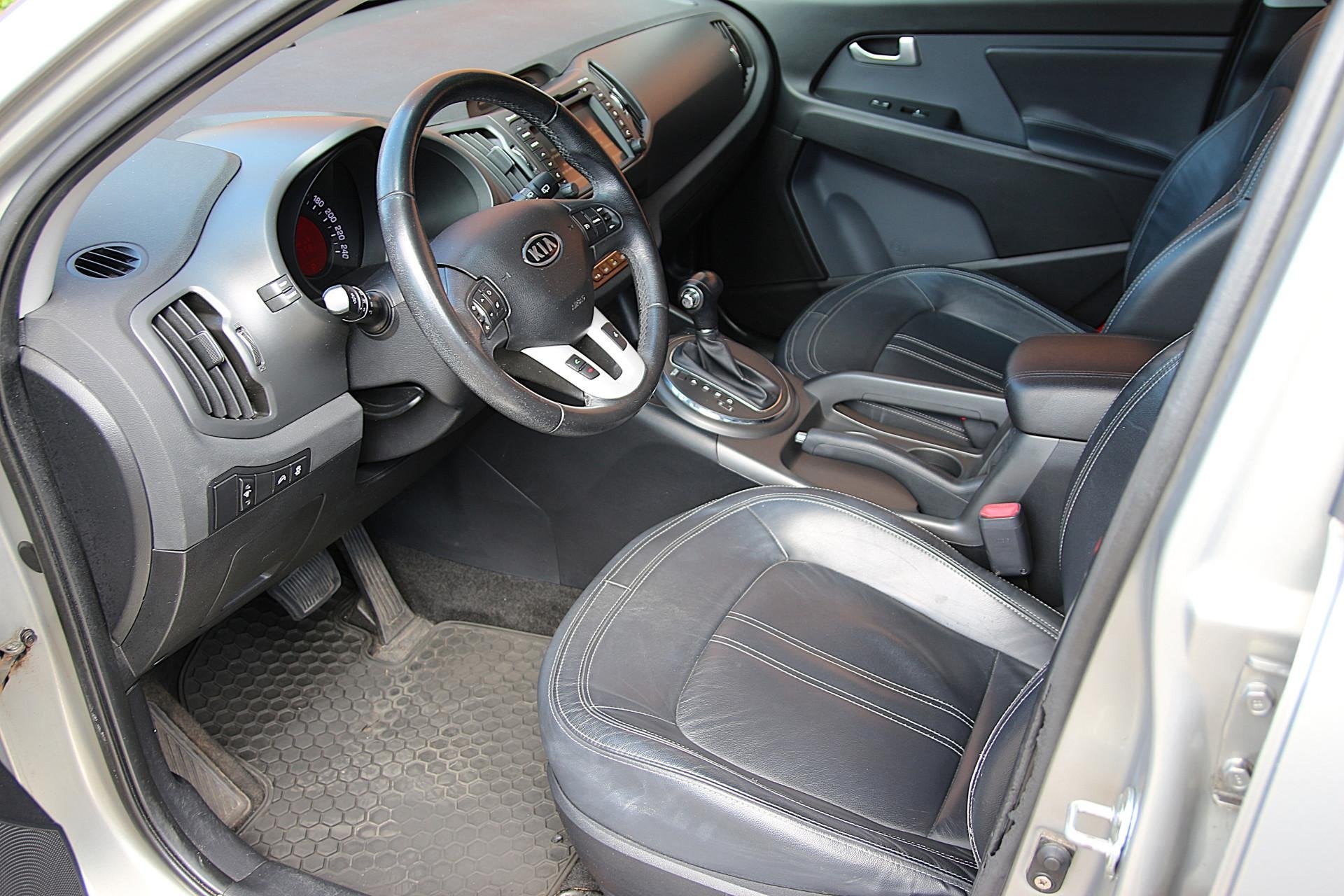 Kia Sportage 2.0 165pk X-clusive AUT. | NL-auto | Automaat |, Auto's, Gebruikt, Zwart, 4 cilinders, 165 pk